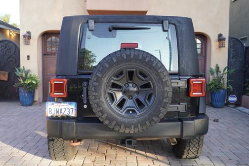 Black 2012 Jeep Wrangler Sport