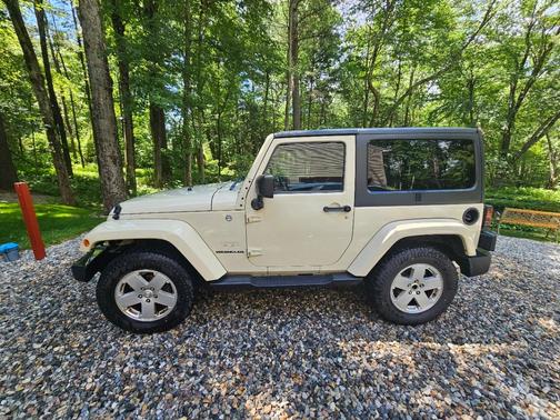 Beige 2011 Jeep Wrangler Sahara
