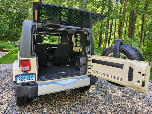 Beige 2011 Jeep Wrangler Sahara