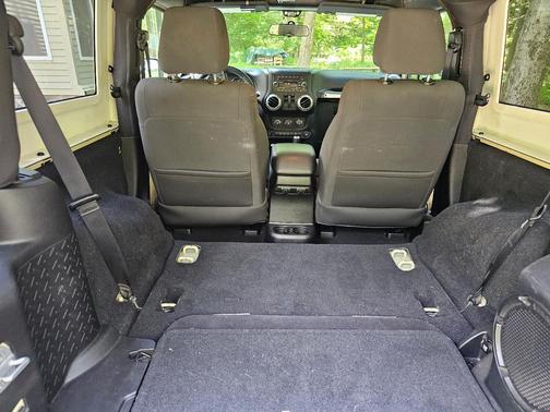 Beige 2011 Jeep Wrangler Sahara
