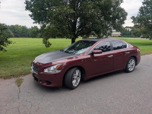 Red 2010 Nissan Maxima S