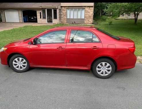 Red 2010 Toyota Corolla LE