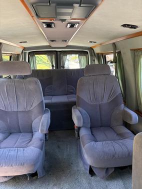 Gold 2002 Ford E150 Base