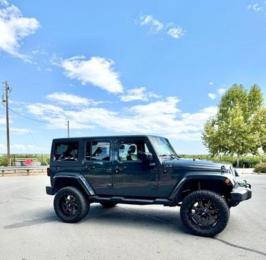 Gray 2016 Jeep Wrangler Unlimited Sahara