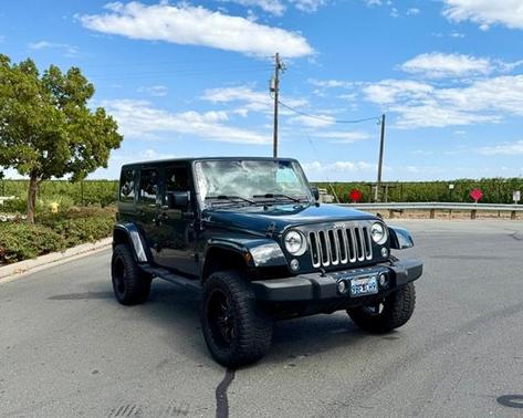 Gray 2016 Jeep Wrangler Unlimited Sahara