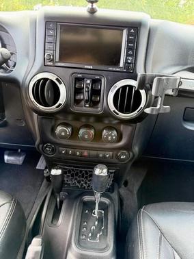 Gray 2016 Jeep Wrangler Unlimited Sahara