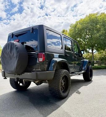 Gray 2016 Jeep Wrangler Unlimited Sahara
