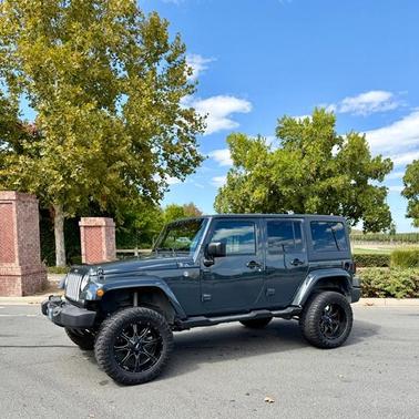 Gray 2016 Jeep Wrangler Unlimited Sahara
