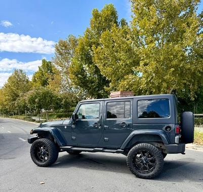Gray 2016 Jeep Wrangler Unlimited Sahara