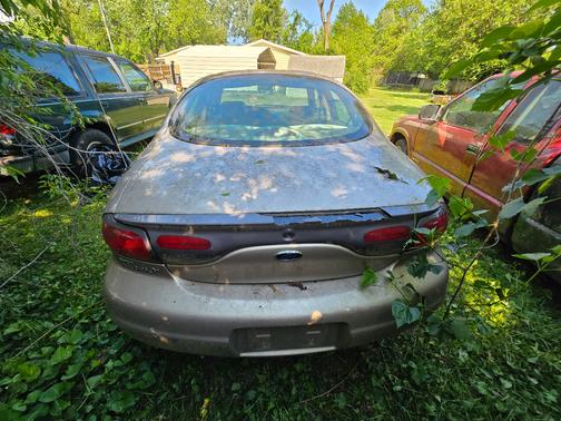 Gold 1999 Ford Taurus LX