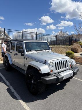 Gray 2011 Jeep Wrangler Unlimited Sahara