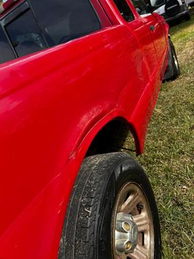 Red 2000 Ford Ranger XLT SuperCab