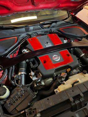 Red 2010 Nissan 370Z Touring