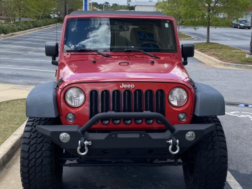 Photo 1 of 10 of 2014 Jeep Wrangler Unlimited Sport