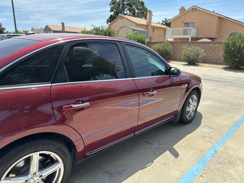 Red 2008 Ford Taurus Limited