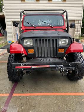 Red 1994 Jeep Wrangler S