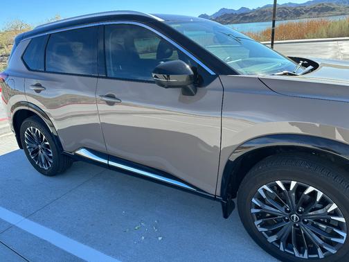 Brown 2024 Nissan Rogue Platinum