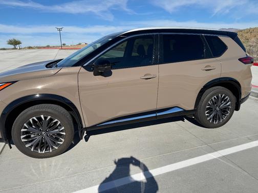 Brown 2024 Nissan Rogue Platinum