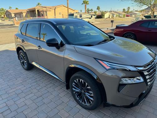 Brown 2024 Nissan Rogue Platinum