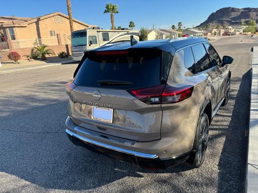 Brown 2024 Nissan Rogue Platinum