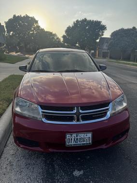 Red 2014 Dodge Avenger SE