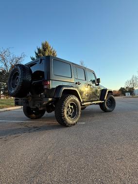 Black 2013 Jeep Wrangler Unlimited Sport