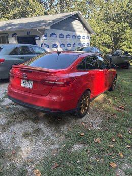 Red 2015 Ford Focus SE
