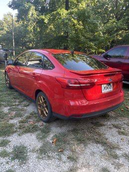 Red 2015 Ford Focus SE