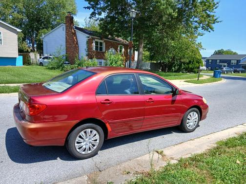 Red 2006 Toyota Corolla LE