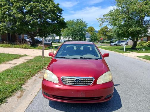 Red 2006 Toyota Corolla LE