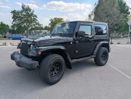 Black 2010 Jeep Wrangler Sahara