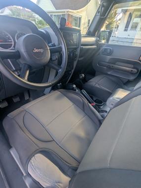 Black 2010 Jeep Wrangler Sahara