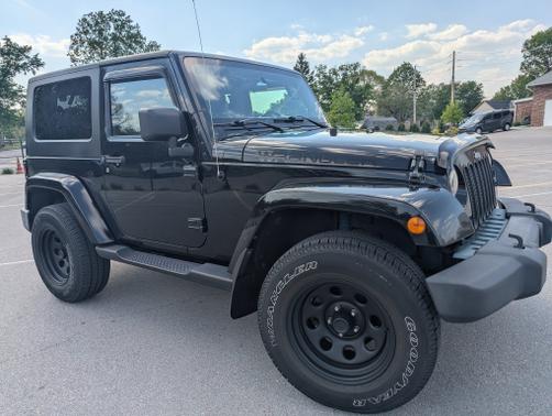 Black 2010 Jeep Wrangler Sahara