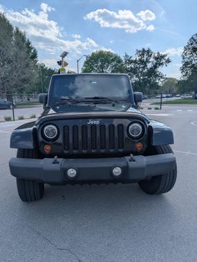 Black 2010 Jeep Wrangler Sahara