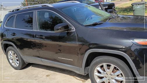 Black 2015 Jeep Cherokee Limited