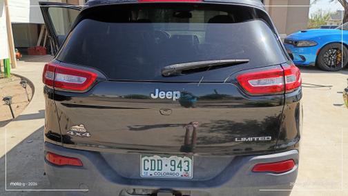 Black 2015 Jeep Cherokee Limited