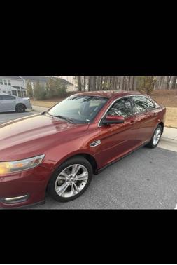 Red 2014 Ford Taurus SEL
