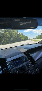 Red 2014 Ford Taurus SEL