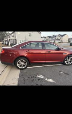 Red 2014 Ford Taurus SEL