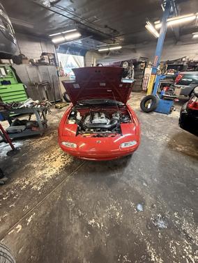 Red 1994 Mazda MX-5 Miata M Edition