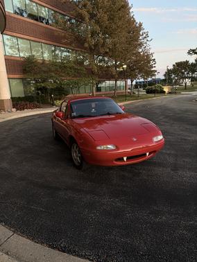 Red 1994 Mazda MX-5 Miata M Edition