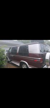 Red 1995 Chevrolet Van Base