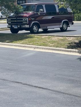 Red 1995 Chevrolet Van Base