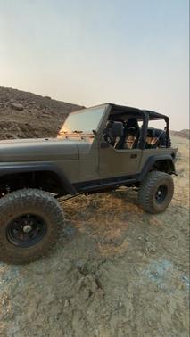 Green 1998 Jeep Wrangler Sport