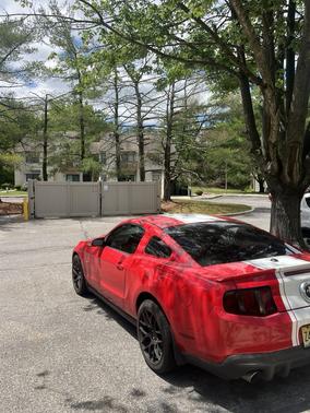Red 2010 Ford Mustang Premium