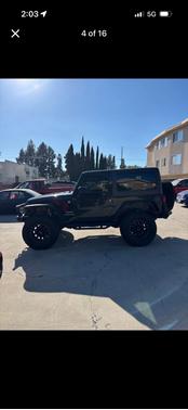 Black 2015 Jeep Wrangler Sport