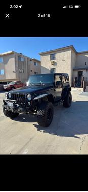 Black 2015 Jeep Wrangler Sport
