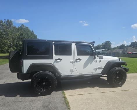 White 2015 Jeep Wrangler Unlimited Sport