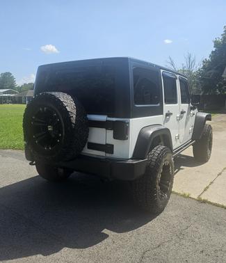 White 2015 Jeep Wrangler Unlimited Sport
