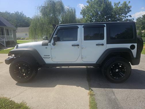 White 2015 Jeep Wrangler Unlimited Sport